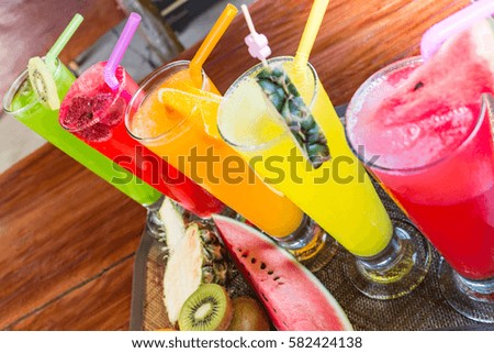 pineapple,watermelon, kiwi, orange, strawberry juice fruit: healthy drinks,diet and detox concept <process color>
