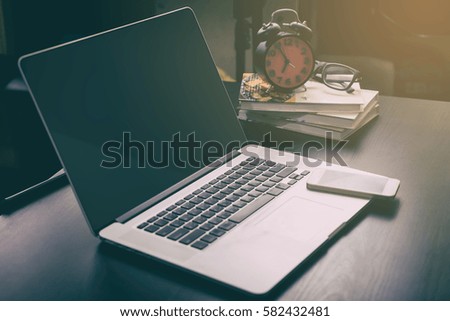 Blank computer laptop on office table