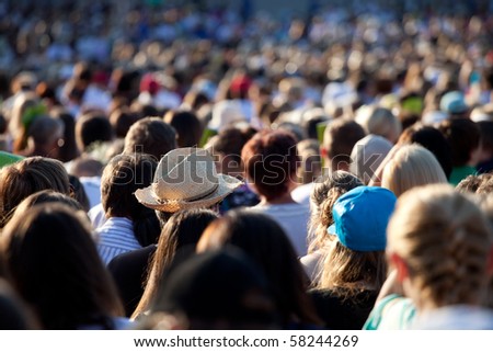 Large crowd of people watching concert or sport event Royalty-Free Stock Photo #58244269