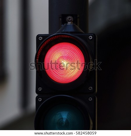 Traffic safety, red color on the traffic light, red circle black square shape traffic light, modern road sign urban design