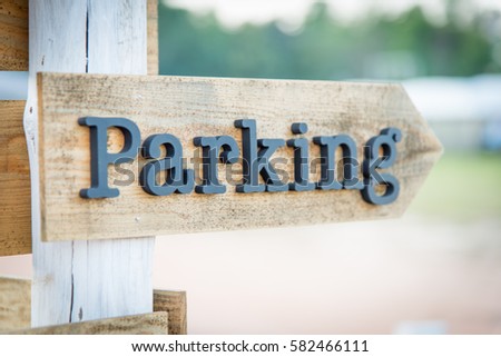 Wooden parking sign