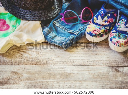 baby items on wooden background. selective focus.