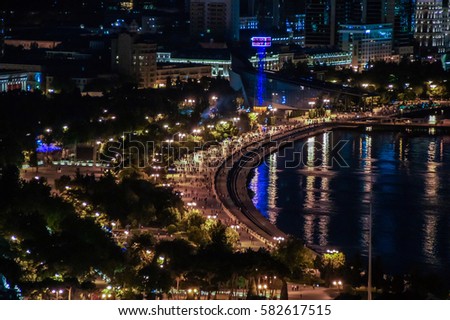 Night View of the city. City view  Promenade at night. Seaside nigth view from top. Night Bright street city lights bird view. spectacular light of the city with seaside Baku