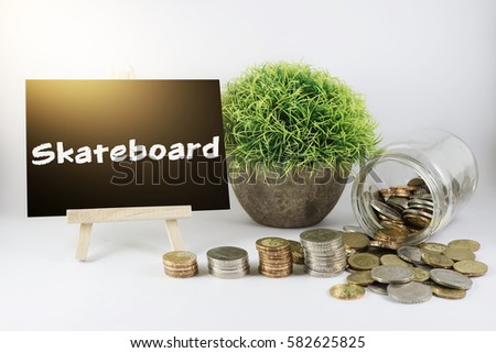 Chalk Board, Pot of Flower and Jar of Coins for Saving Concept