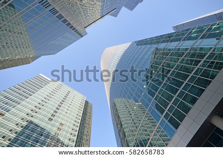 Skyscrapers in a business district on a sunny morning