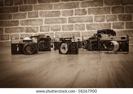 old cameras on a wood old photo