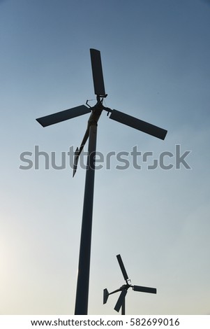  Wind turbine with silhouette  background