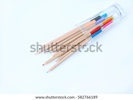 A stack of colored pencils on white background