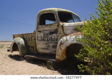 Old car in the famous route 66 road in USA