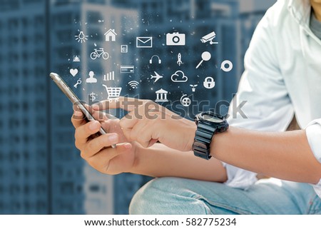 mobile apps concept.Business man hands holding touch screen smartphone ,application Royalty-Free Stock Photo #582775234