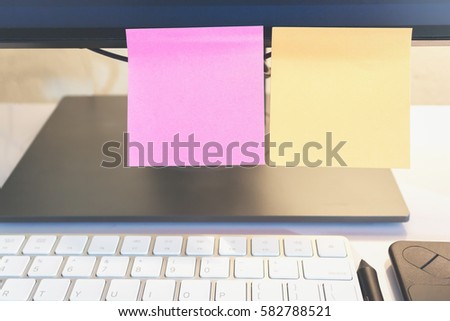 Abstract of blank paper and stick paper on laptop. paper note copy space, Design can also enter text in the ad.