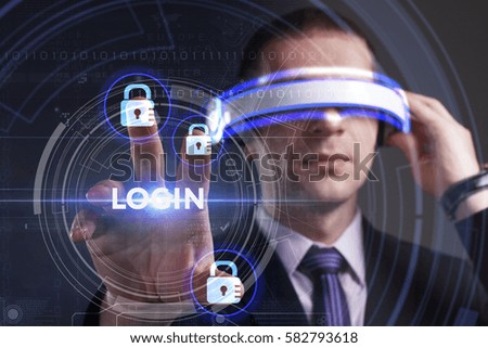 Business, Technology, Internet and network concept. Young businessman working in virtual reality glasses sees the inscription: Login