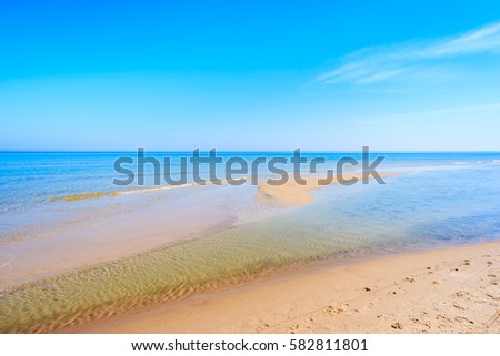 Azure calm sea water on Lubiatowo beach, Baltic Sea, Poland
