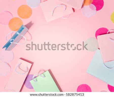 image of miniature paper bags and bright confetti
