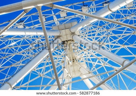 urban geometry ferris wheel view from below metal framing