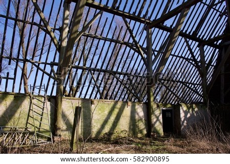 Abandoned farm, roof without cane