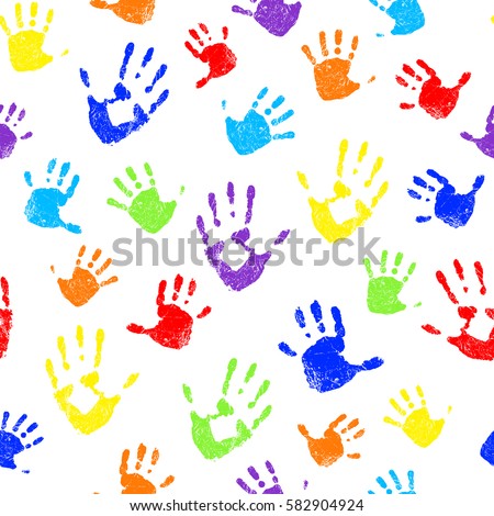 Seamless pattern with rainbow colored family hand prints on white background. Vector illustration. Royalty-Free Stock Photo #582904924