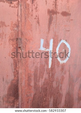 Old wall with rusty smudges and peeling paint. Abstract texture. Number 40