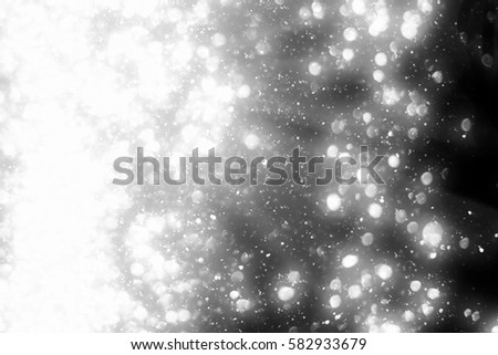 High resolution falling snow isolated on black background . Design element