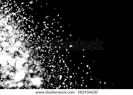 Snowflakes particles and white bokeh or glitter lights on silver background. Abstract template