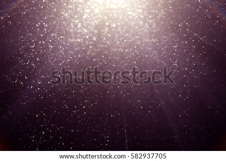 Abstract Festive Pink or serenity background. Bokeh light and sparkles. Magic glitter lights Royalty-Free Stock Photo #582937705