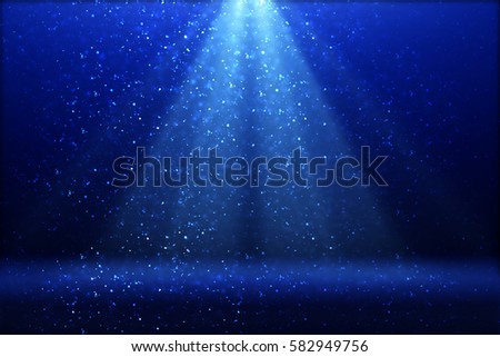 Stage light and blue glitter lights on floor. Abstract background for display your product. Spotlight realistic ray Royalty-Free Stock Photo #582949756