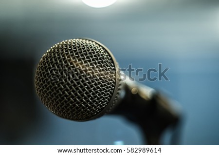 Close up dynamic microphone in recording studio