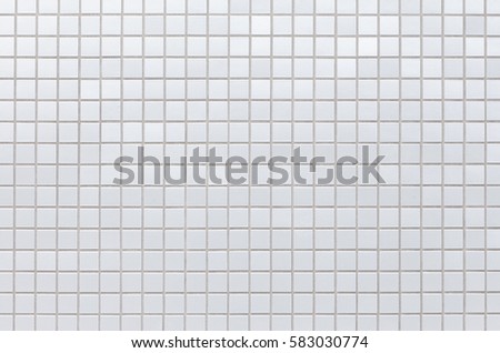 White brick stone wall seamless background and texture
