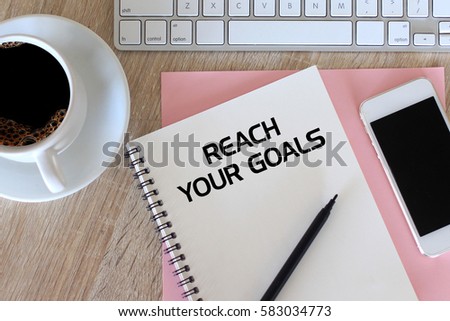 Business concept - Top view notebook writing Search Your Goals
