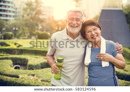 Senior Adult Couple Exercise Fitness Strength Royalty-Free Stock Photo #583124596