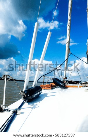 beautiful white yacht sails in the summer on the water. Part of the marine vessel