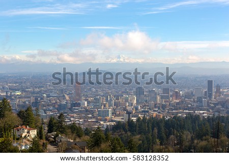 Portland Oregon downtown cityscape with Mt Hood on a beautiful sunny day scenic view