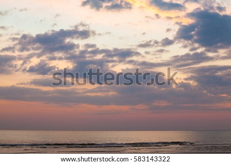 background of the sky with clouds at sunset