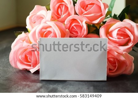 blank white paper and roses bouquet,  for valentine mother's day or birthday concept with copy space