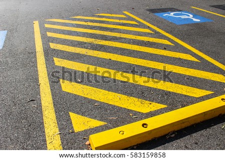 traffic sign on asphalt pavement