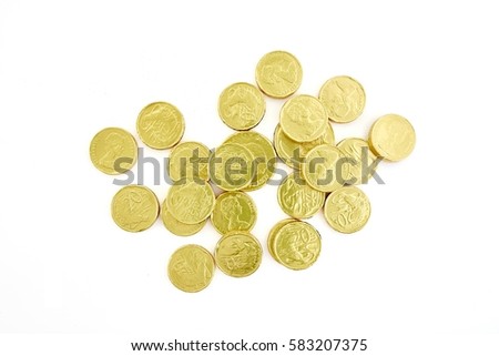 A studio photo of chocolate gold coins