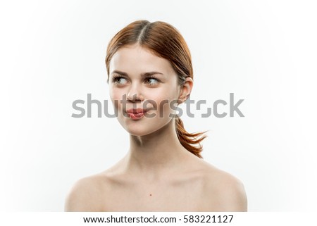 portrait of a beautiful brunette on a white background