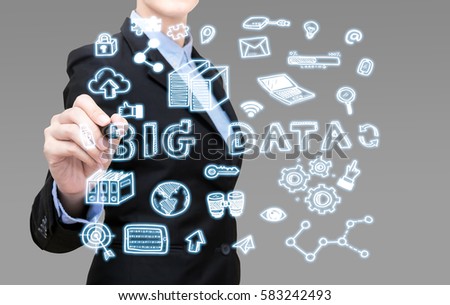 Young Smart business woman writing big data idea concept. Elegant Design for technology in the future for wireless communication network infrastructure of the information society.