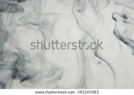 Background cuttlefish ink dissolving in water