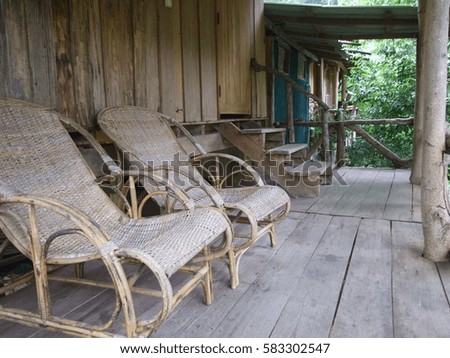 two chairs on the porch