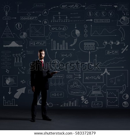 Businessman with computer tablet.  Schematic background. Business and office, concept.