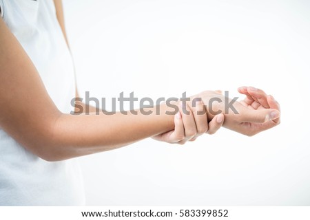 Pain in the joints of the hands. Carpal tunnel syndrome. Isolated on white background,health care concept. Royalty-Free Stock Photo #583399852