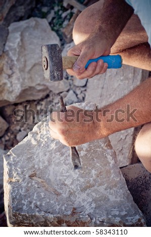 Stonemason at work Royalty-Free Stock Photo #58343110