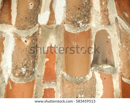 Texture of a roof tiles on a wall