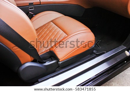 Car Seats. Car interior luxury service. Car interior details Royalty-Free Stock Photo #583471855