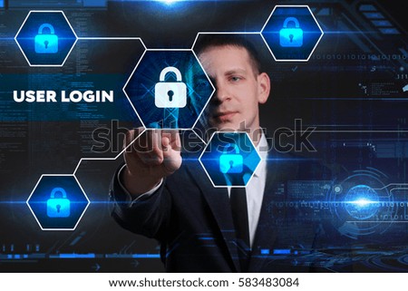 Business, Technology, Internet and network concept. Young businessman working on a virtual blackboard of the future, he sees the inscription: user login 