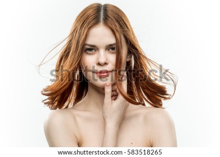 portrait of a beautiful brunette on a white background