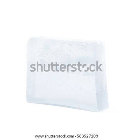 Handmade semi-transparent bar of soap isolated over the white background