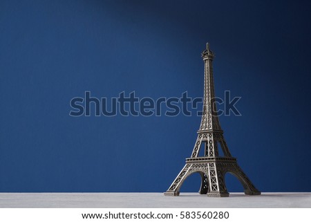 Souvenir Eiffel Tower on a blue background