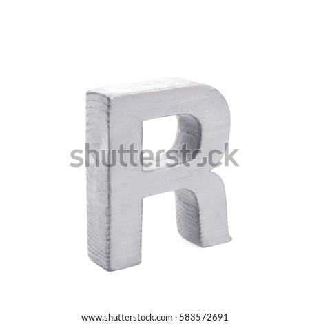 Single sawn wooden letter R symbol coated with paint isolated over the white background